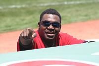 Red Sox hitter David Ortiz acknowledges the fans behind the dugout prior to the start of today's game. Papi won it in the ninth, with a walk-off home run.